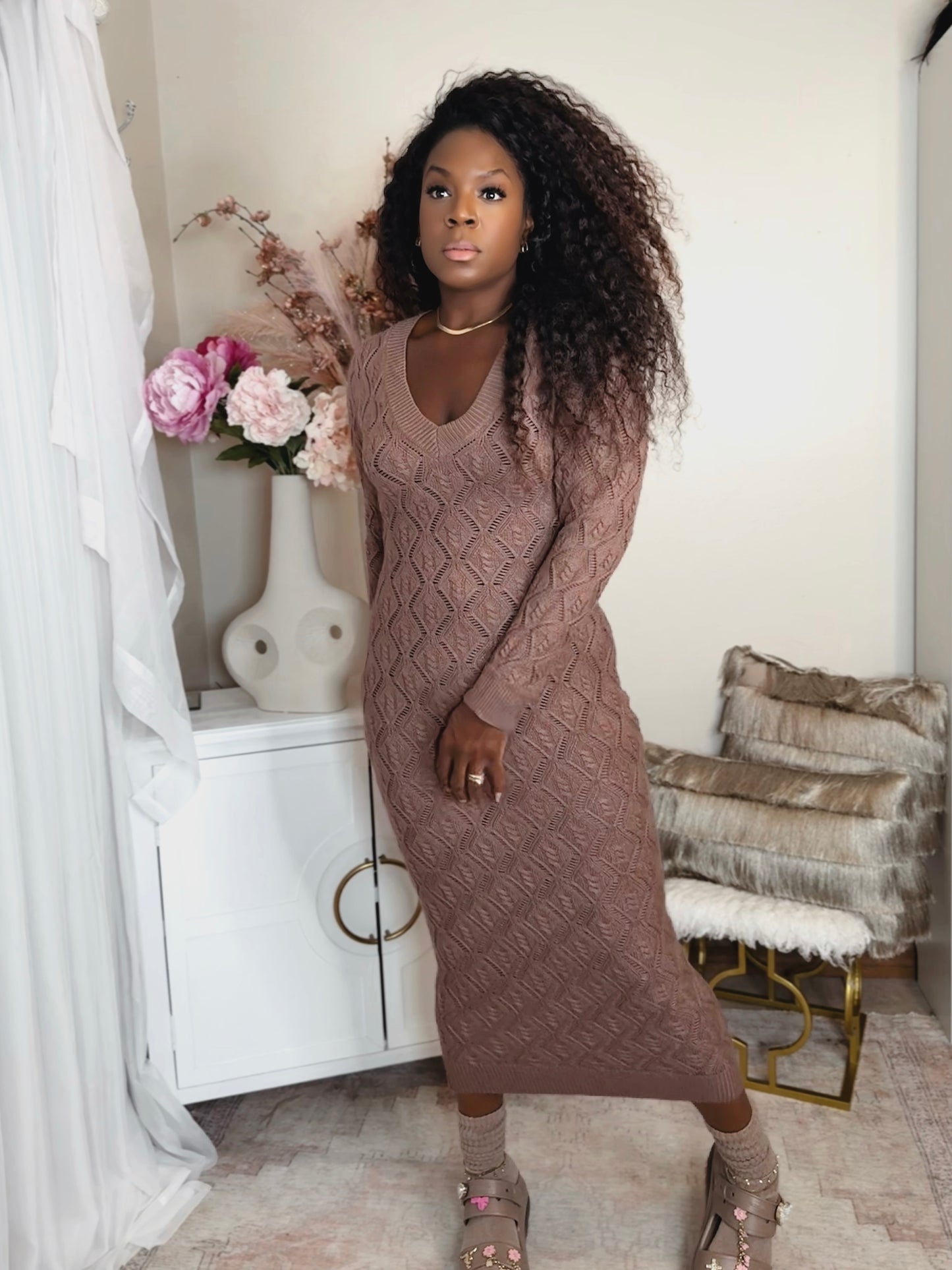 Woman wearing brown body language cable knit dress in rich mocha front view