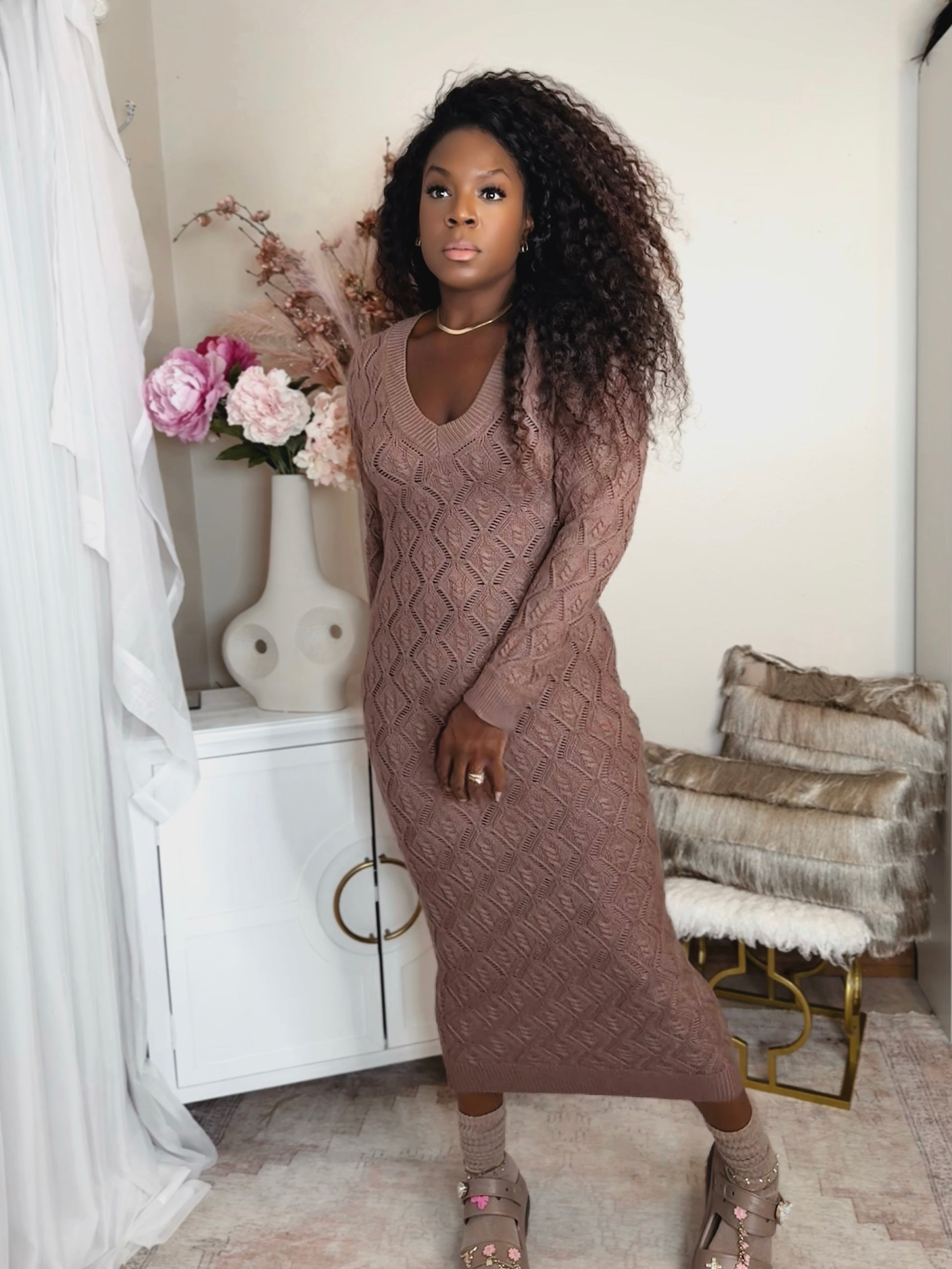 Woman wearing brown body language cable knit dress in rich mocha front view