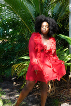 Load image into Gallery viewer, Woman wearing a romantic date night dress called the Veronica chiffon ruffle dress with long sleeves. It laces up in the center chest area.